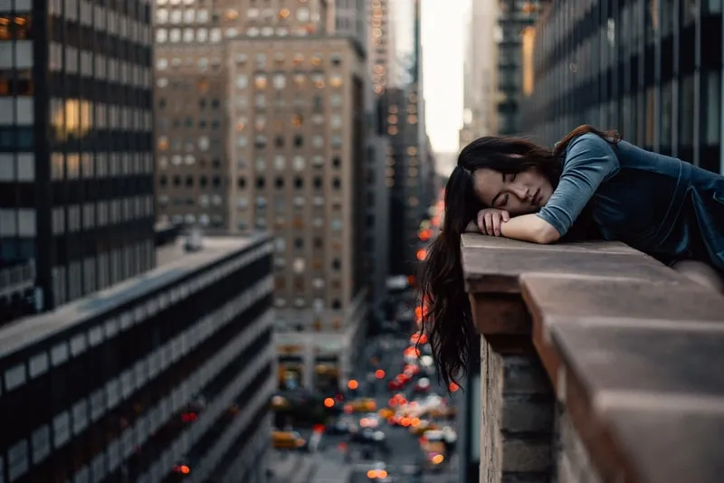 woman-take-nap-on-balcony.jfif